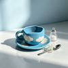 Cloud Pattern Wavy Rim Ceramic Cup And Saucer Set